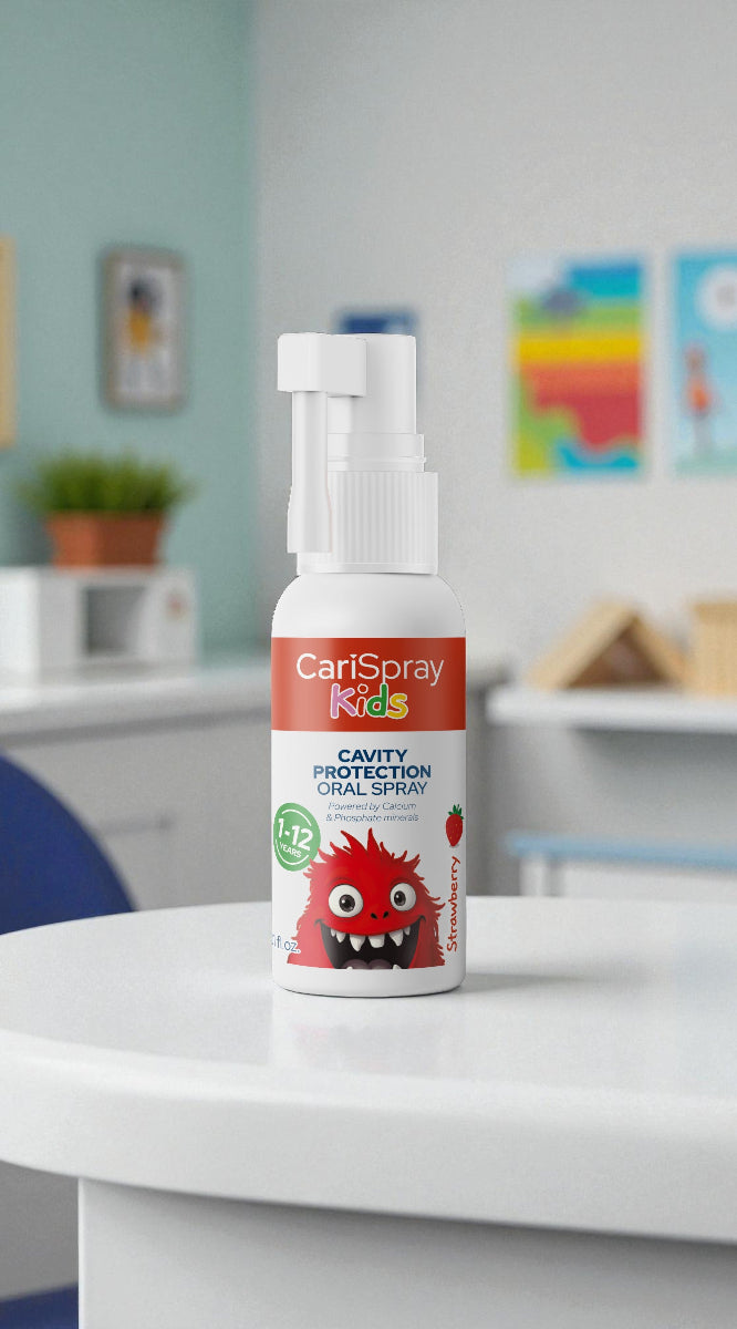 CariSpray Kids cavity protection oral spray bottle on a white surface with a colorful background.